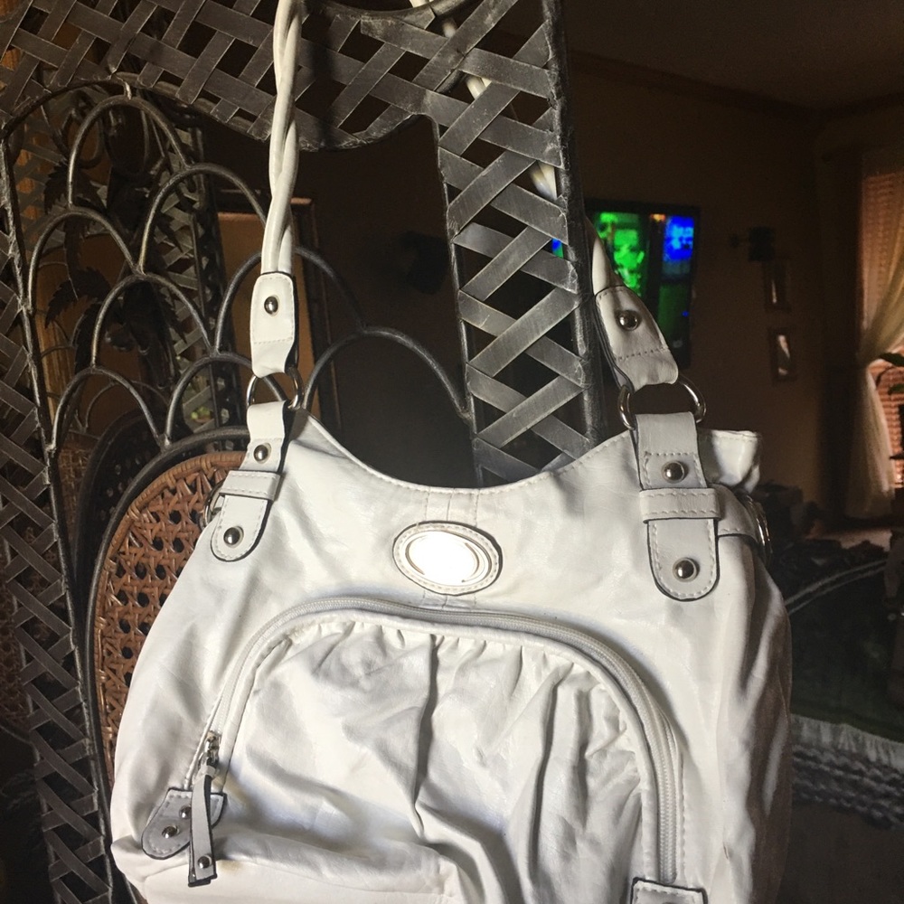 Rosetti white purse with matching wallet.